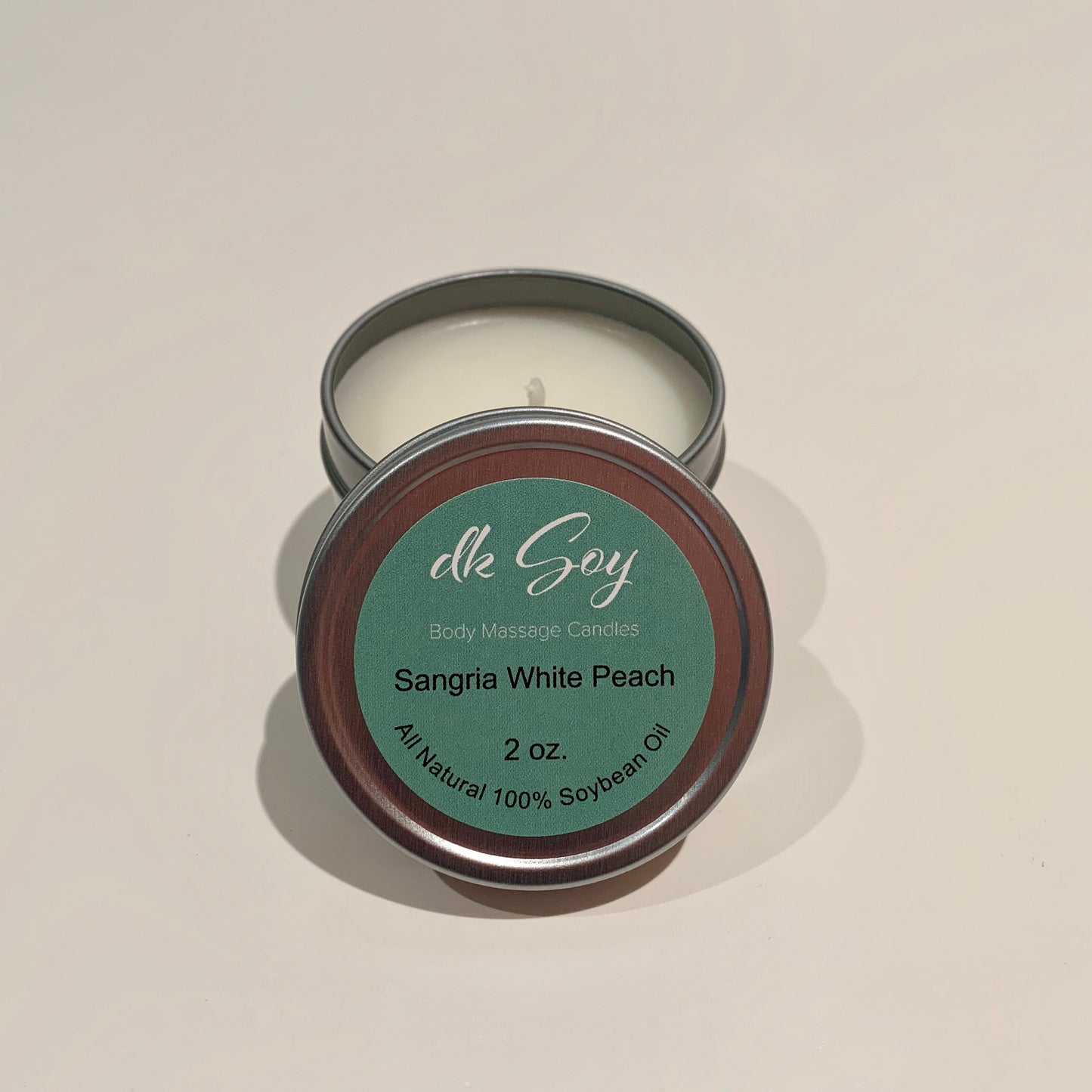 mini sangria white peach travel tin massage oil candle